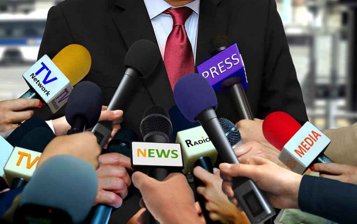 Man in a Suit Being Interviewed for Media