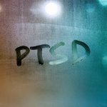 PTSD written on a window