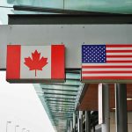 Canadian flag and US flag