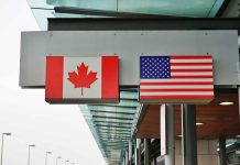 Canadian flag and US flag