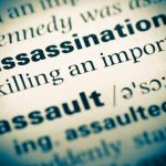 Assassination written on paper