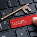 Banned typed on a keyboard
