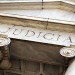 Judicial written on marble