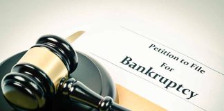 Gavel on bankruptcy petition document
