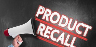 Person holding megaphone Product Recall text