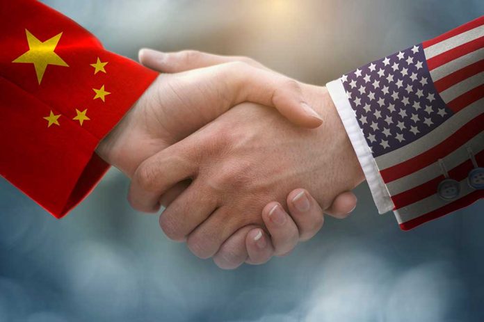 1431101585 featured image Chinese and American flag sleeves shaking hands