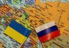 The Russian and Ukrainian flags on a map