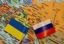 The Russian and Ukrainian flags on a map