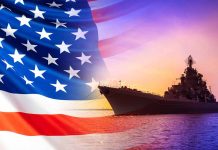 American flag overlaying warship at sunset