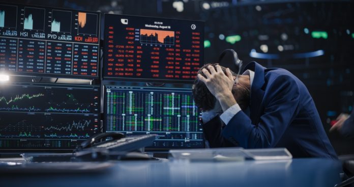 2388692919 featured image Trader stressed out by multiple declining stock charts