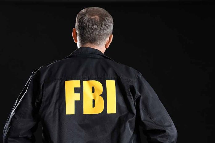 2473870221 featured image FBI agent with back facing the camera