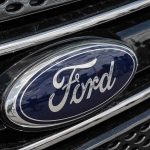 Ford logo on car grille closeup