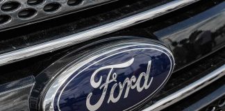 Ford logo on car grille closeup