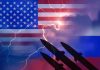American and Russian flags with missile silhouettes and lightning