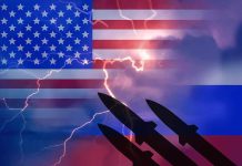 American and Russian flags with missile silhouettes and lightning