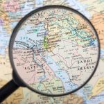 Magnifying glass over the Middle East and Egypt