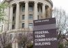 Federal Trade Commission Building with sign and trees