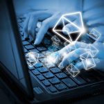 Hands typing on a laptop keyboard with floating email icons