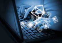 Hands typing on a laptop keyboard with floating email icons