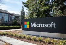 Microsoft sign with office buildings and trees
