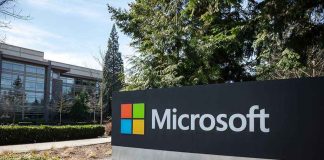 Microsoft sign with office buildings and trees