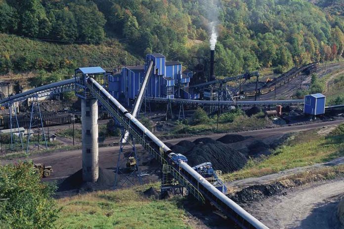 136340531 Industrial coal processing plant with conveyor belts and smokestack