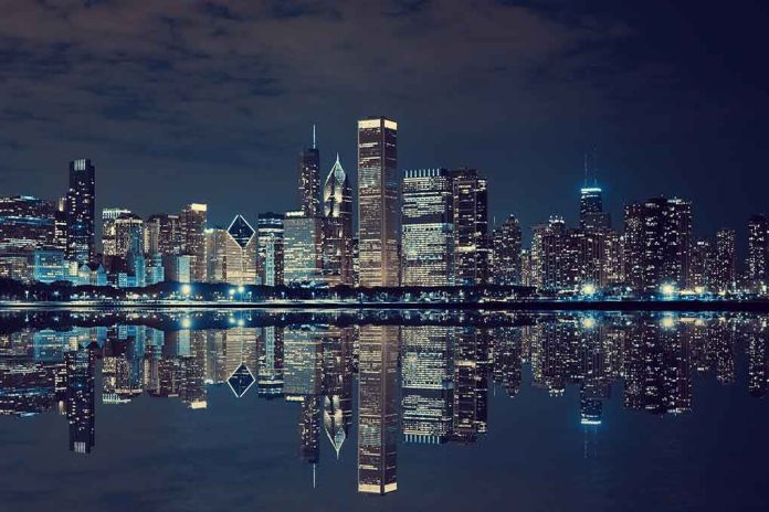 shutterstock_207683059.jpg Nighttime view of a city skyline with reflections on water