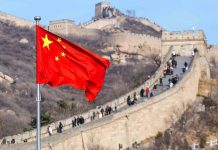 Chinese flag by the Great Wall of China