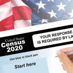 Hand filling out the U.S. Census 2020 form