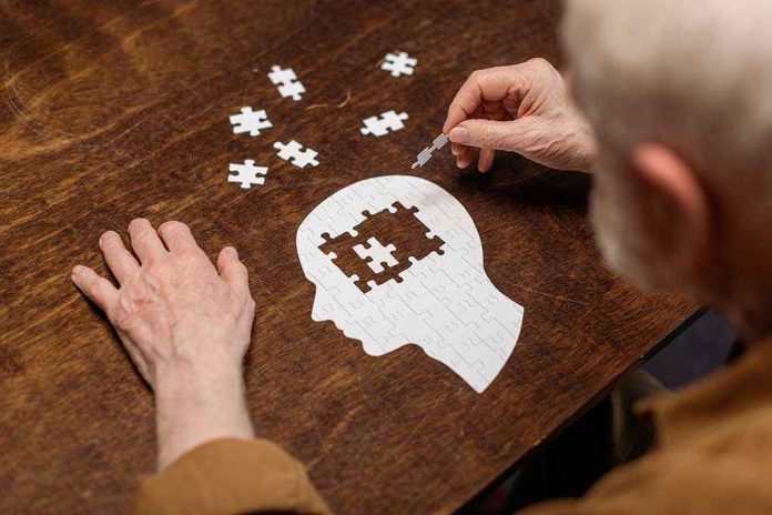 1776503864 Elderly person completing head-shaped jigsaw puzzle