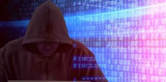 Person in hoodie using laptop, surrounded by digital code.