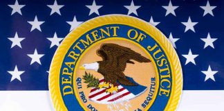 Department of Justice seal on American flag background