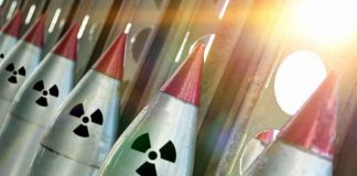 Criminal Uranium Deal Rattles GLOBAL Security Line of nuclear missiles with radiation hazard signs