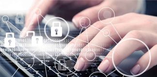 Hands typing with cybersecurity icons overlay