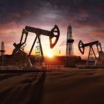 Massive Oil Disruption Looms: Russia on the Brink Oil rigs operating at sunset in a desert landscape