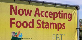 Massive EBT Scam Busted—City in Shock Yellow sign now accepting food stamps EBT SNAP