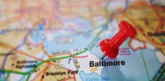 Red pushpin marking Baltimore on a map