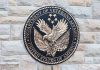 Dramatic Initiative Aims to End Veteran Suffering Department of Veterans Affairs seal on brick wall