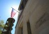 ANOTHER DOJ Referral: Political Storm Brewing American flag at Department of Justice building exterior