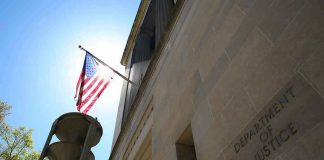 American flag at Department of Justice building exterior