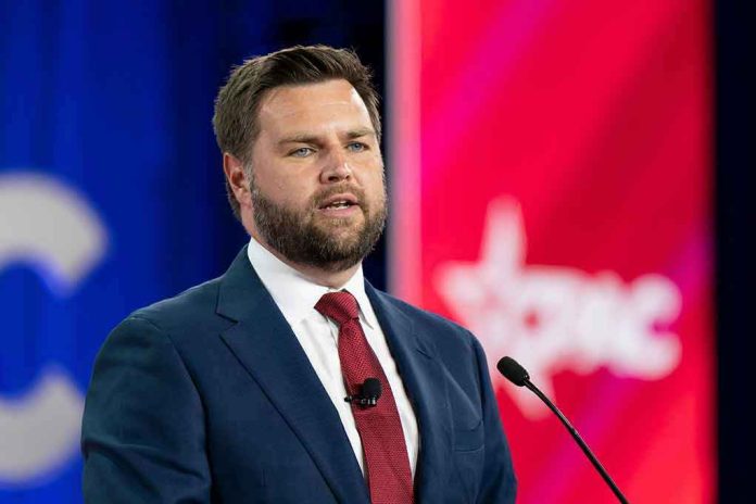 2186937099 Man in a suit speaking at a podium