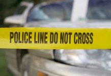 ICE Chase Turns Fatal — Tragedy on Highway Yellow police tape in front of a car