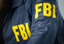 FBI jacket with yellow letters