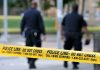 Deadly Swatting Rampage—Cops Missed Every Sign Police officers walking past caution tape at a crime scene