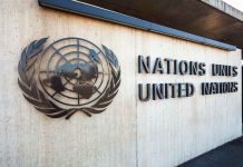 Facade of the United Nations building featuring the UN emblem and text