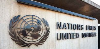 UN’s Grip on US Borders SHATTERED! Facade of the United Nations building featuring the UN emblem and text