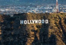 The Hollywood sign on a hillside.