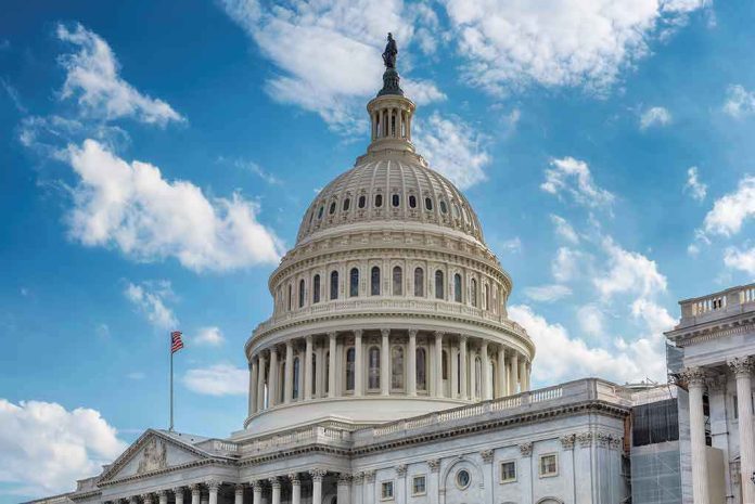 1349634086 U.S. Capitol building dome under clear blue sky.