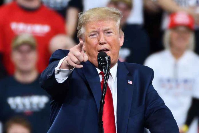 1585237510 Man in suit pointing speaking at a rally