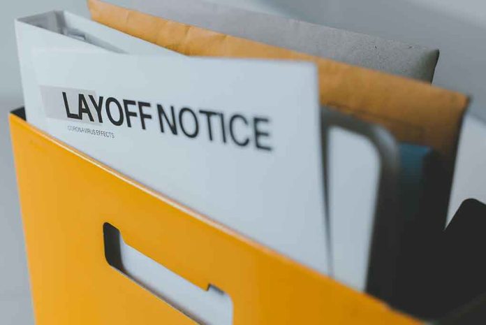 172298839 Layoff notice in a yellow box